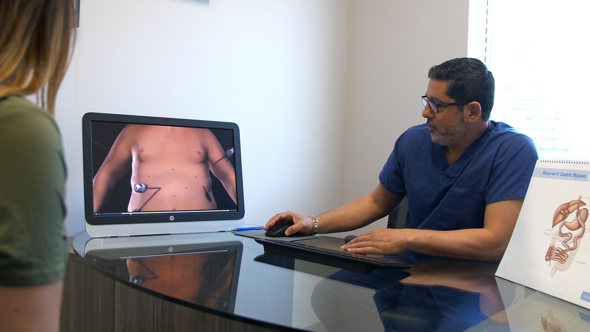 Dr. Ragui Sadek Showing a Video of Surgery During Appointment at Advanced Surgical & Bariatrics